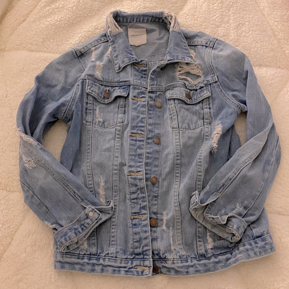 Distressed denim jacket